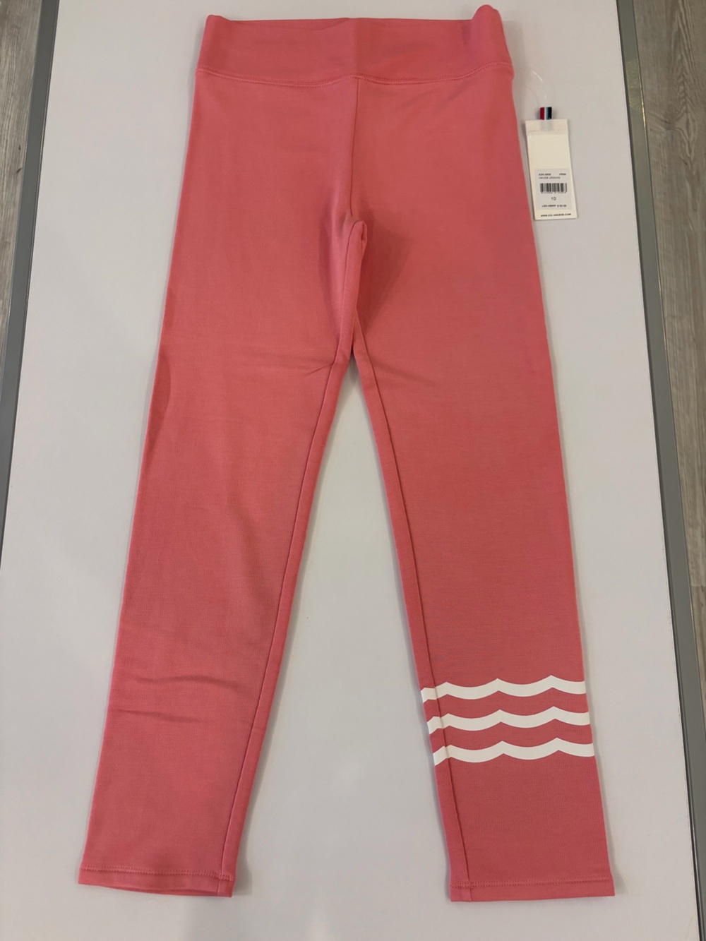 Sol Angeles Coral Pink Kids Leggings with White Wave Trim
